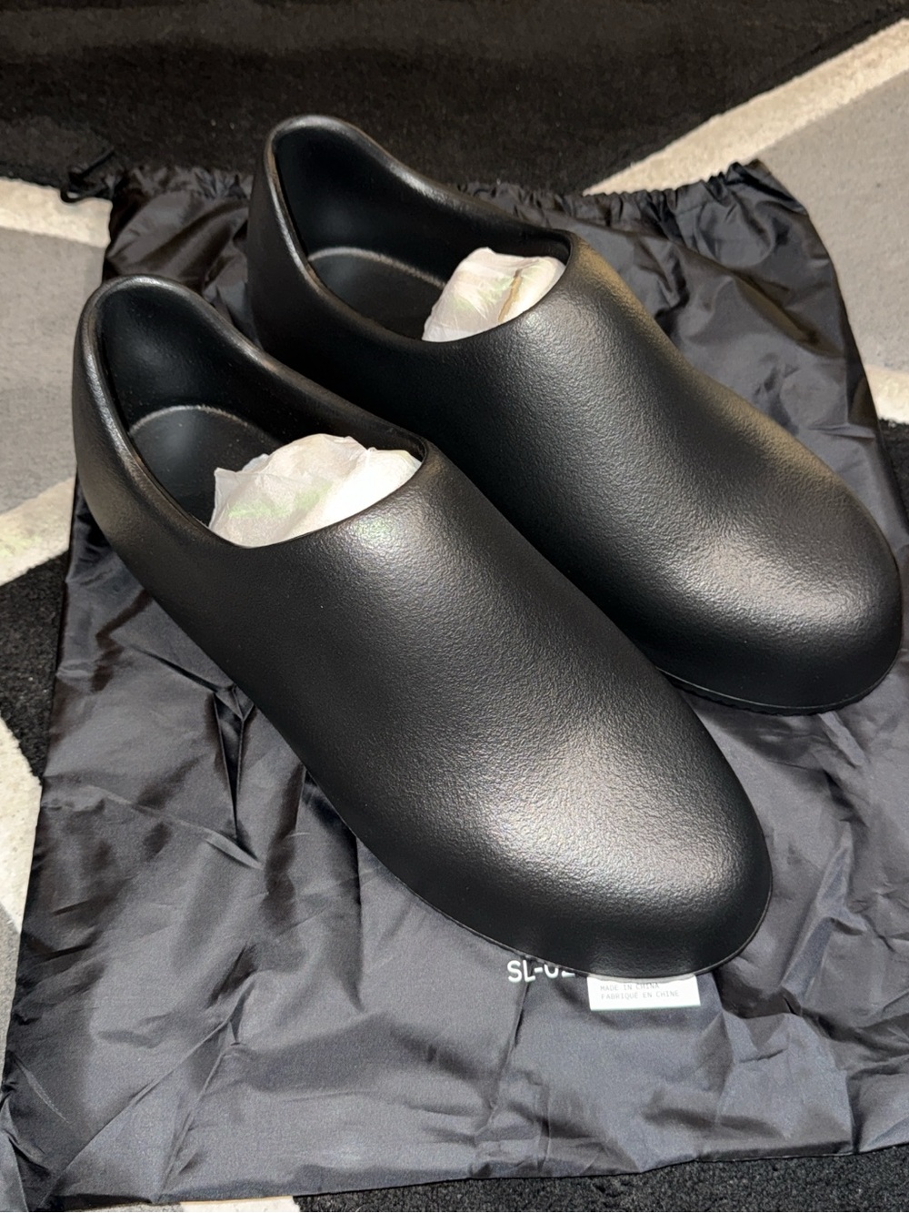 Yeezy Men's Black Minimal Slip-On Clog